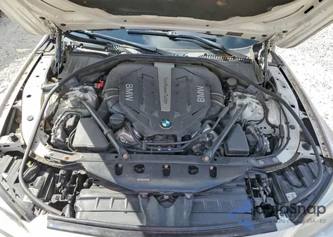 2014 BMW 750 Li из США, поврежденный, VIN WBAYE8C58ED134987